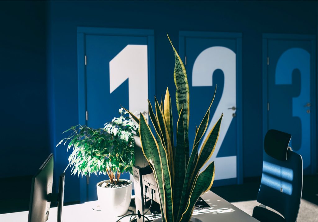 Numbered phone booths in office